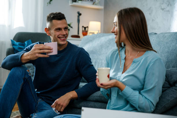 istock Couple having a bonding moment during a coffee break while moving 1346771263