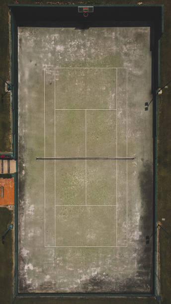 istock Top down view grass tennis court 1346774352