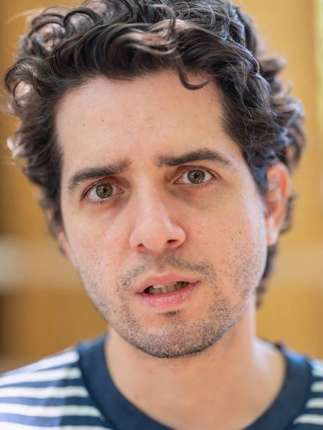 istock Mid adult man looking at the camera 1346775468