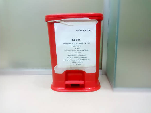 istock Medical waste bin isolated in laboratory, red bio-hazard waste bin 1346779568