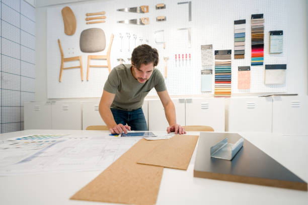 istock Designer working on a sketch for a new project at his office 1346781646
