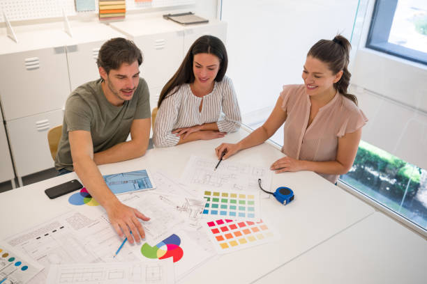 istock Interior designer talking to clients about their home improvement project 1346781664