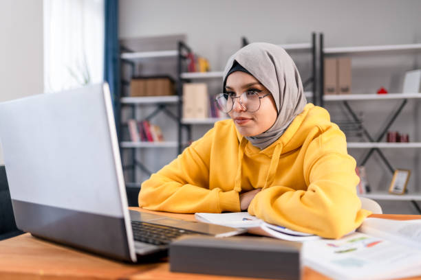 Middle Eastern Girl attending a Video Call stock photo