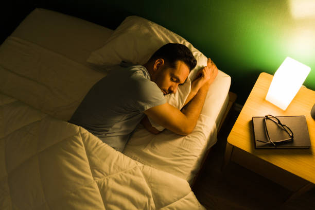 istock Top view of a relaxed man sleeping 1346783141