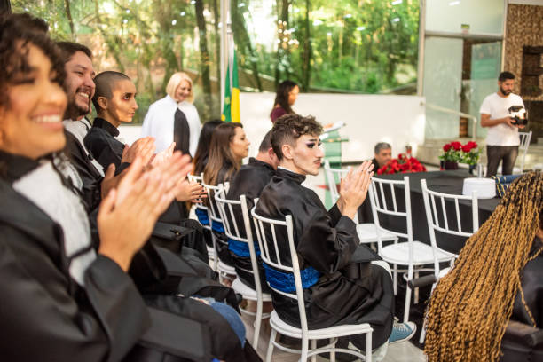 istock Group of graduates on graduation day 1346783400
