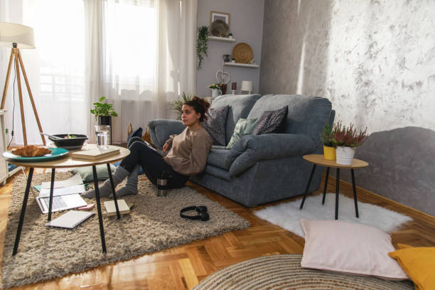 istock Taking a break to think of the solution to a homework she is writing 1346783479