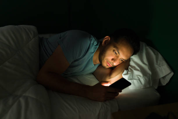 istock Watching online videos on my phone 1346783518