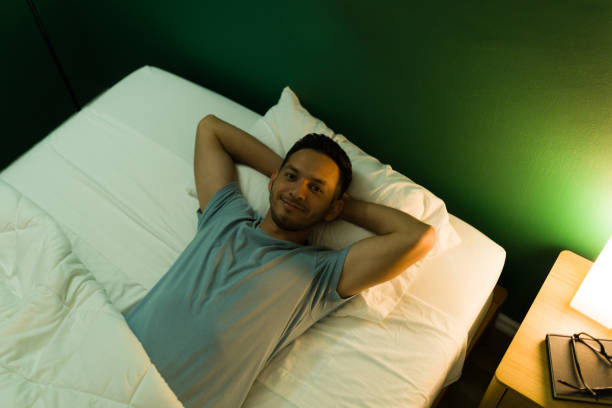 istock Top view of a handsome man preparing to sleep 1346783855