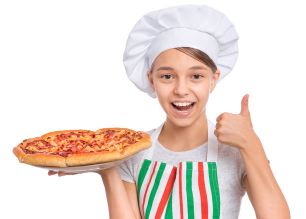 istock Girl chef holding pizza on white 1346783862