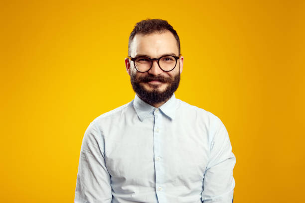 istock Satisfied handsome man grins at camera, glad to find suitable well paid job 1346784792