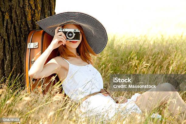 Woman With Vintage Camera Sitting Outdoors Stock Photo - Download Image Now - Old-fashioned, One Woman Only, Retro Style
