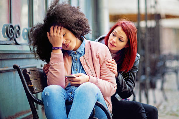 istock Woman is consoling her girlfriend 1346786921