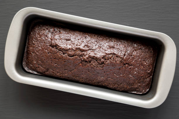 istock Homemade Chocolate Zucchini Bread on a black surface, top view. Flat lay, overhead, from above. 1346786926