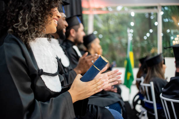 istock Group of graduates at the graduation ceremony. 1346787238