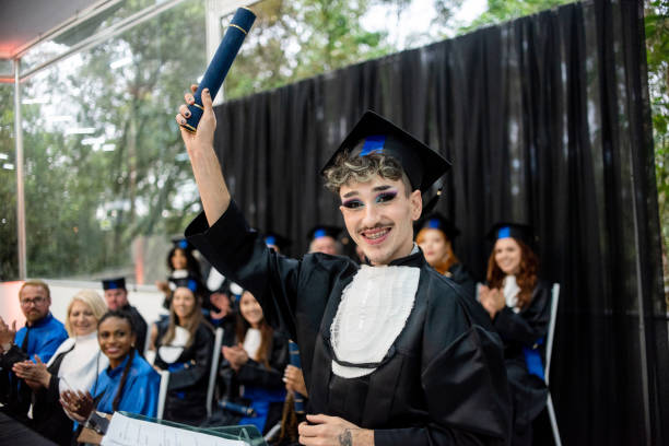 istock Non-binary person portrait on graduation day. 1346787349