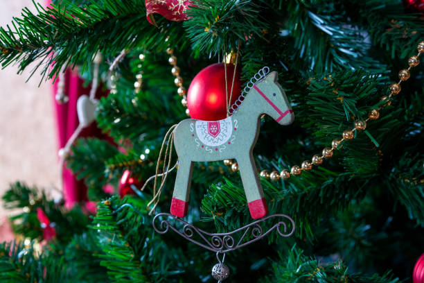 istock Shiny Christmas balls on pine branches 1346793176