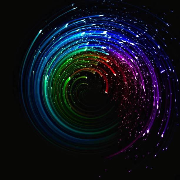 istock Abstract background swirling with colorful lights 1346798446