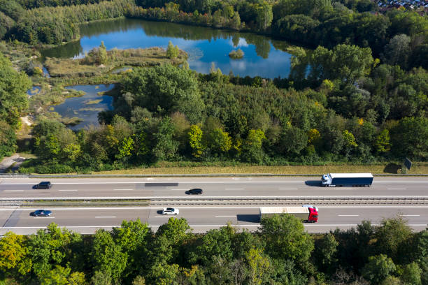 istock Traffic on rural highway, aerial view 1346807172