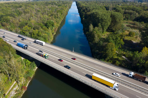 istock Traffic, highway bridge, canal, aerial view 1346807907