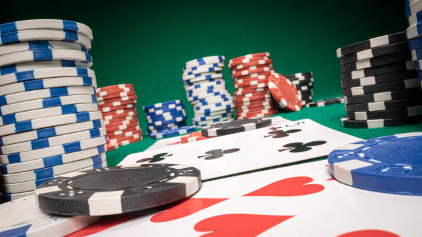 istock Green gambling table during the game. Poker game 1346823097