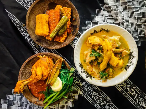 Photo of Rujak Soto, Tempong Rice or Nasi Tempong, and Tempeh Penyet is traditional food from the Banyuwangi, East Java, Indonesia.