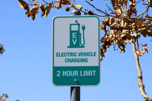 istock Electric Vehicle Charging Parking Sign, 2 Hour Limit 1346839869