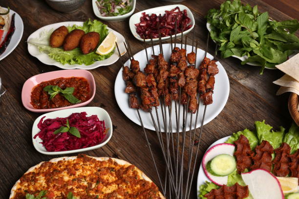 istock various salads with skewers of meat 1346844709