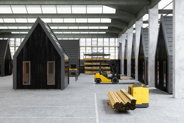 Interior Of Warehouse With Prefabricated Container Houses And Forklift Truck Interior Of Warehouse With Prefabricated Container Houses And Forklift Truck prefabricated building stock pictures, royalty-free photos & images