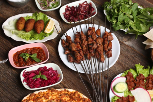 istock various salads with skewers of meat 1346844770