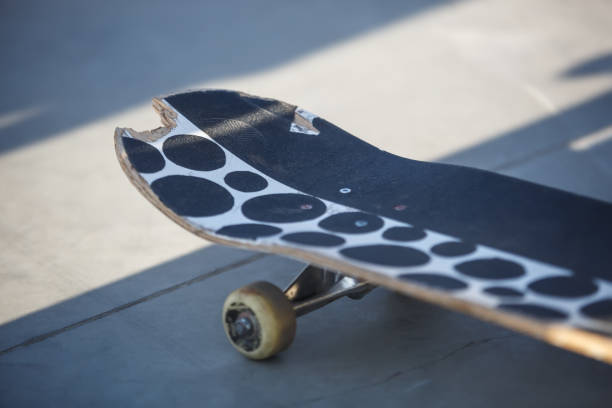 istock Old skateboard deck for tricks and grinds in skate park 1346846483