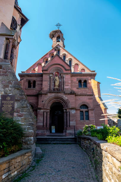 istock Eguisheim Square with its old Romanesque church 1346849994