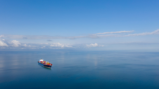 Aerial view of cargo ship in transit.