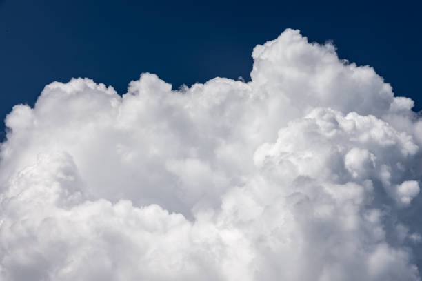 istock Cumulus cloud in rainy season 1346852754