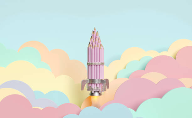 istock rocket of pencils flying over pastel colored flat clouds 1346852755