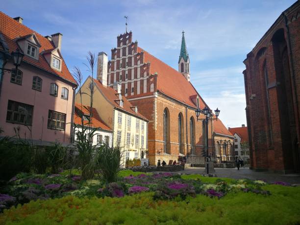 istock Urban scene in Riga with St. John Church. 1346857352