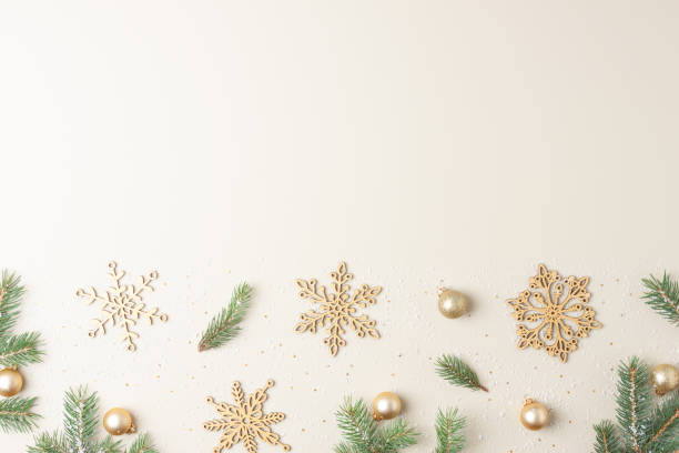 istock Christmas background with Christmas decorations on beige pastel. Flat lay, copy space 1346860309