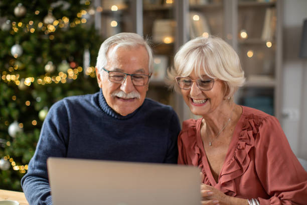 istock Senior couple for Christmas at home 1346862726