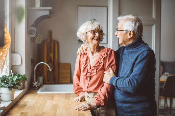 istock Senior couple for Christmas at home 1346862765