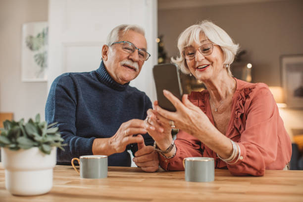 istock Senior couple for Christmas at home 1346863541