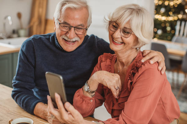 istock Senior couple for Christmas at home 1346863554