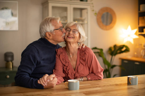 istock Senior couple for Christmas at home 1346863597