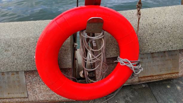 istock Life buoy on the seafront for rescue 1346864596