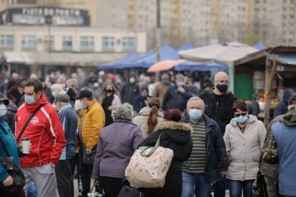 Crowd of people at the Obor market in Bucharest during the Covid-19 pandemics. Bucharest, Romania - May 17, 2021: Crowd of people at the Obor market in Bucharest during the Covid-19 pandemics. bucharest people stock pictures, royalty-free photos & images