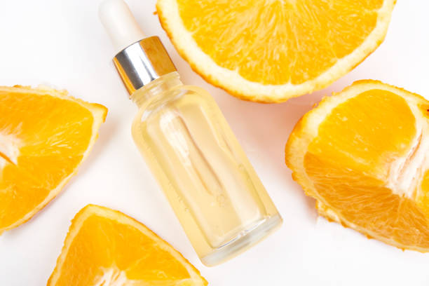 istock Oranges and essential oil on white background. Natural medicine concept. Aromatherapy 1346868328