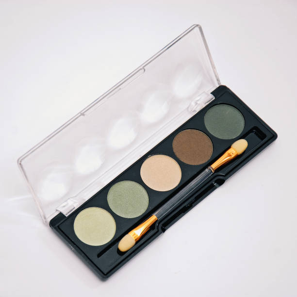 istock Palette of eye shadows on the white background 1346872714
