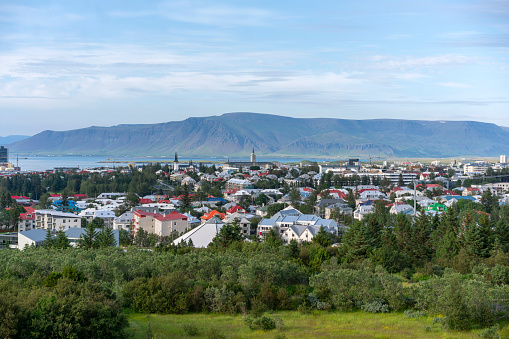 Top view of capital of Iceland, Reykjavík with ocean in background.