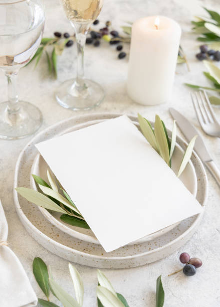 istock Wedding Table place with a card decorated with olive branches 1346877291