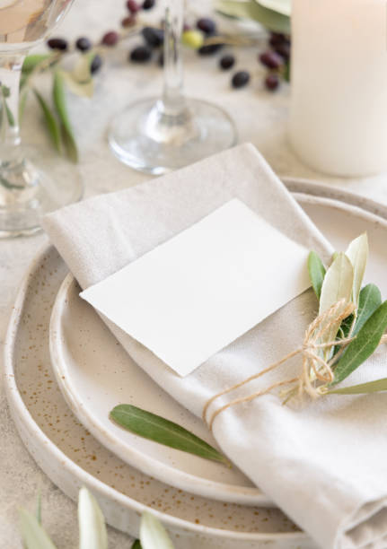 istock Wedding Table place with card decorated with olive branches 1346877293