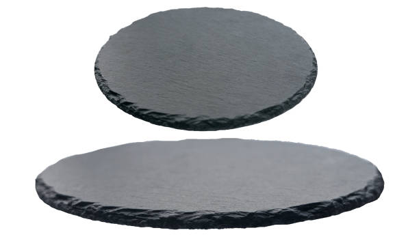 istock A set of black slate round stone isolated on white background. 1346881753