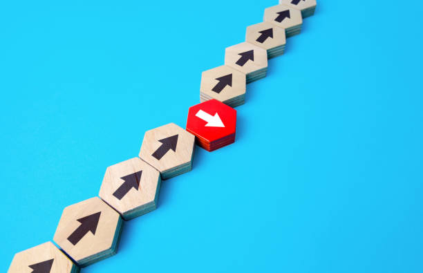 istock An arrow breaks formation. Process chain breaking. Thinking outside the box. New strategies and solutions. Atypical thinking leadership qualities. Denial of conformism. Detachment and uniqueness 1346885872